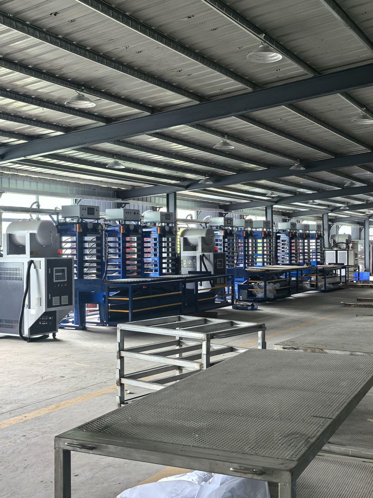 Hot press machines on the factory floor