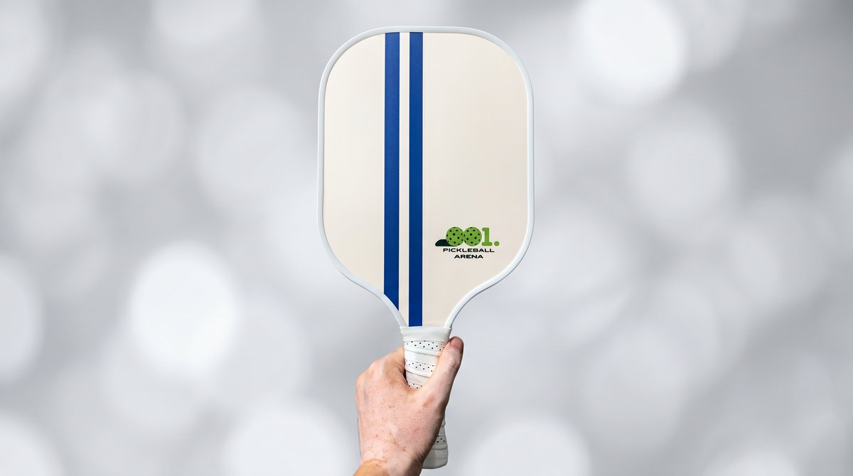 Custom branded pickleball paddle with client logo and blue stripe colorway